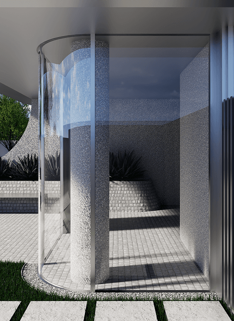The entrance of Komo building. Cureved floor-to-ceiling windows in a beautiful entryway